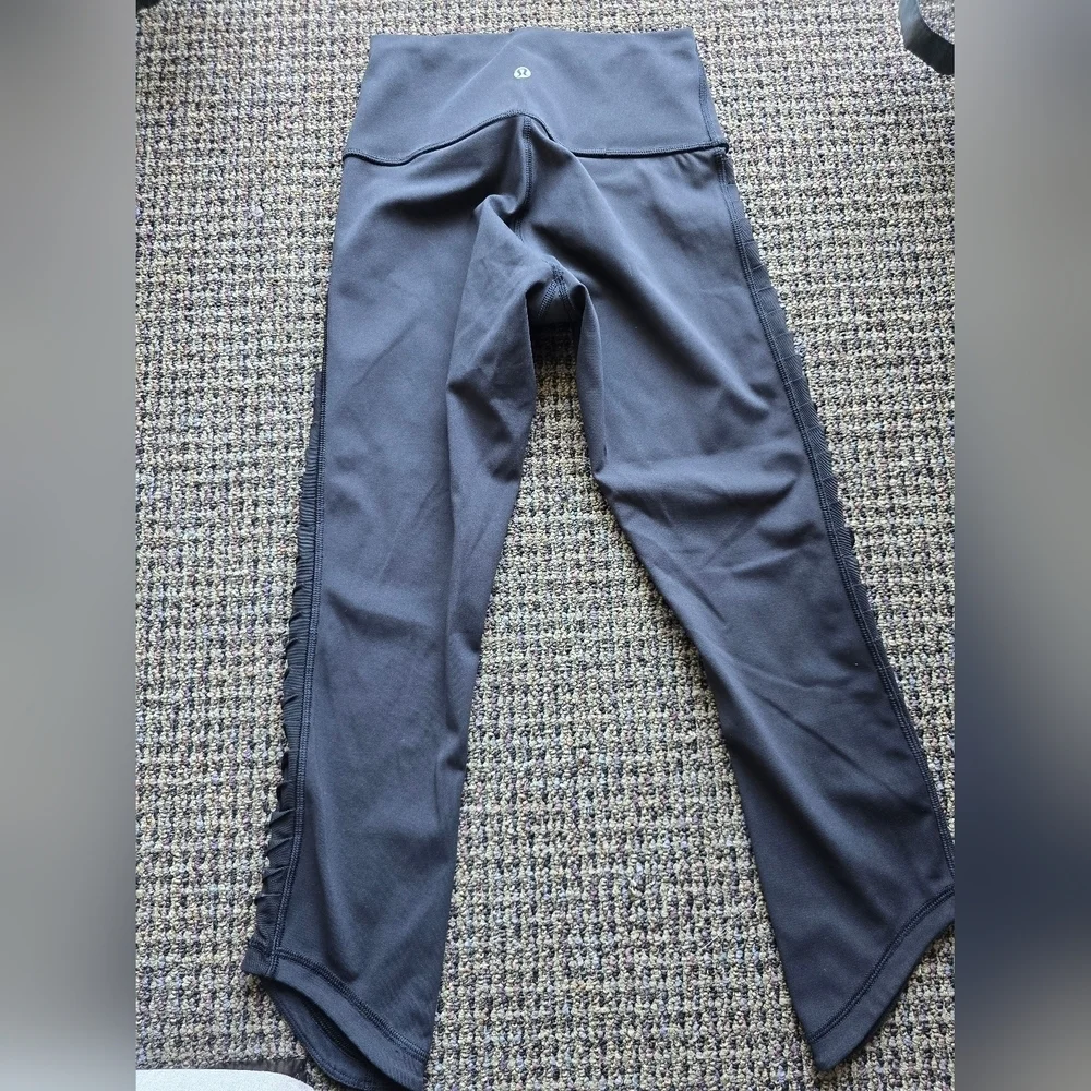 Lululemon Athletica Black Capris with Mesh Accents